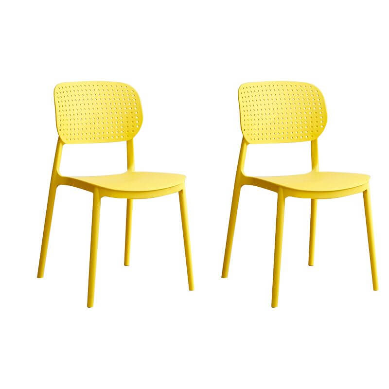 Stackable Scandinavian style plastic and acrylic side chair with low back for dining