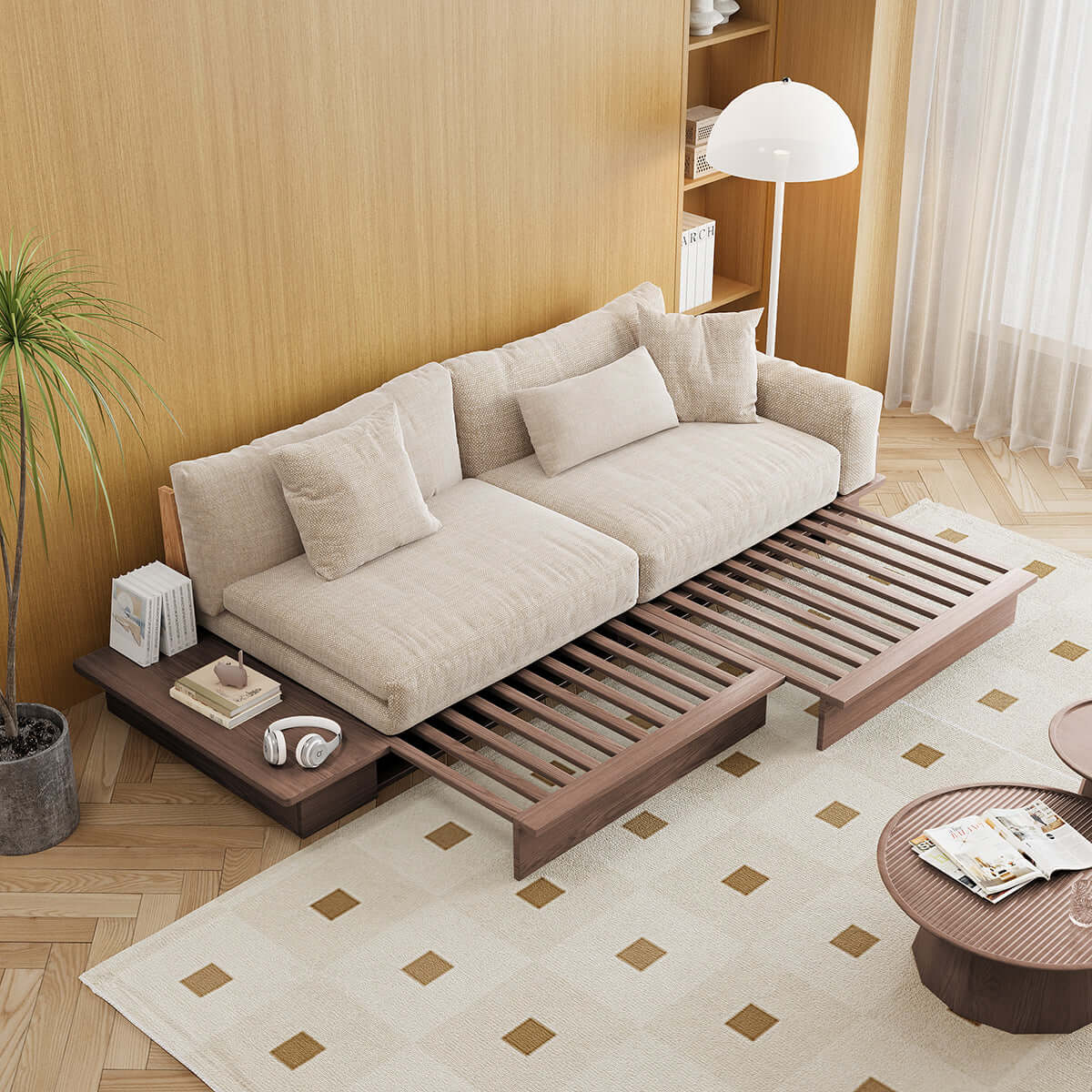 Modern pull-out floor sofa bed with reversible armrests and lift-top storage for space-saving comfort