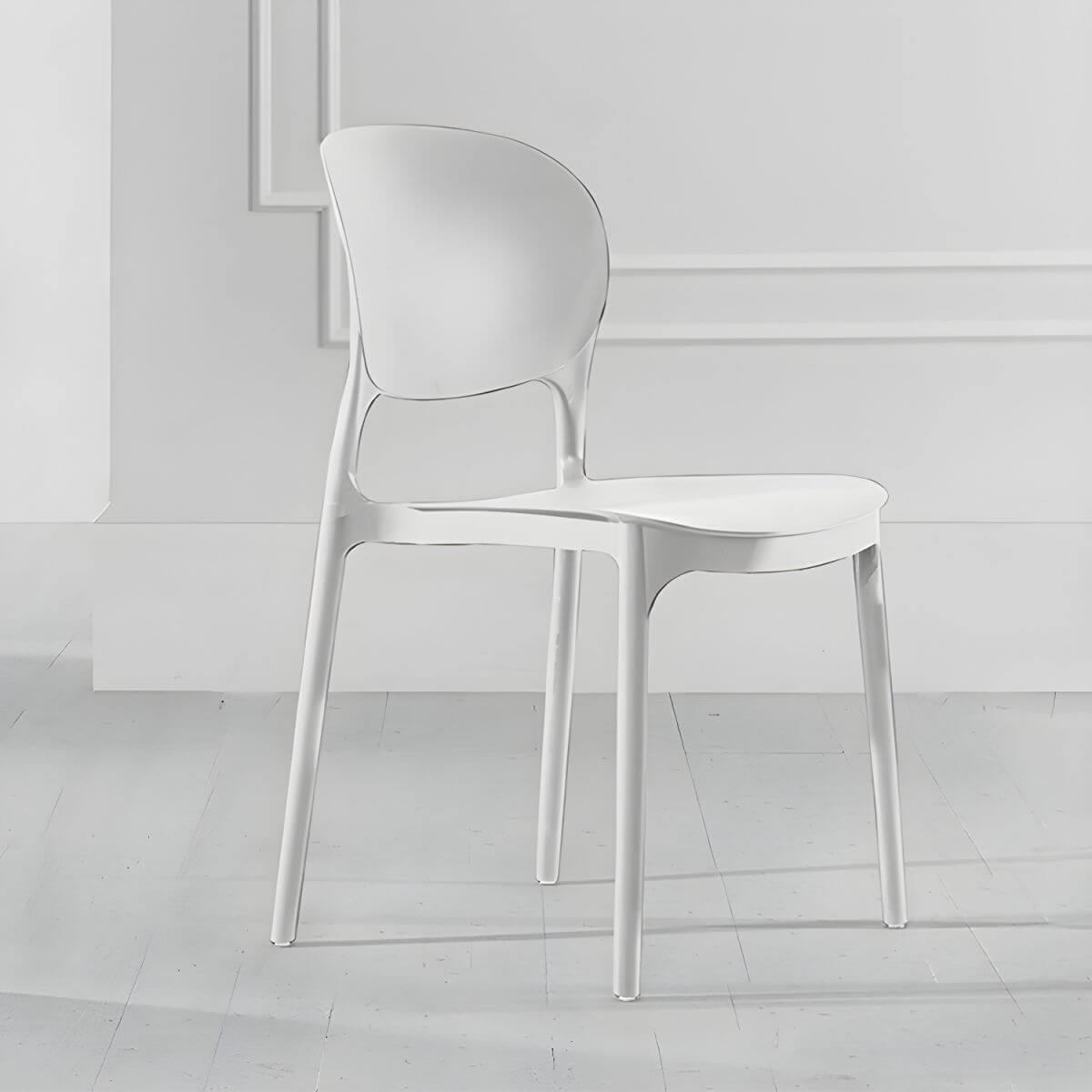 Stackable modern side chair with low back made of plastic and acrylic, perfect for contemporary dining