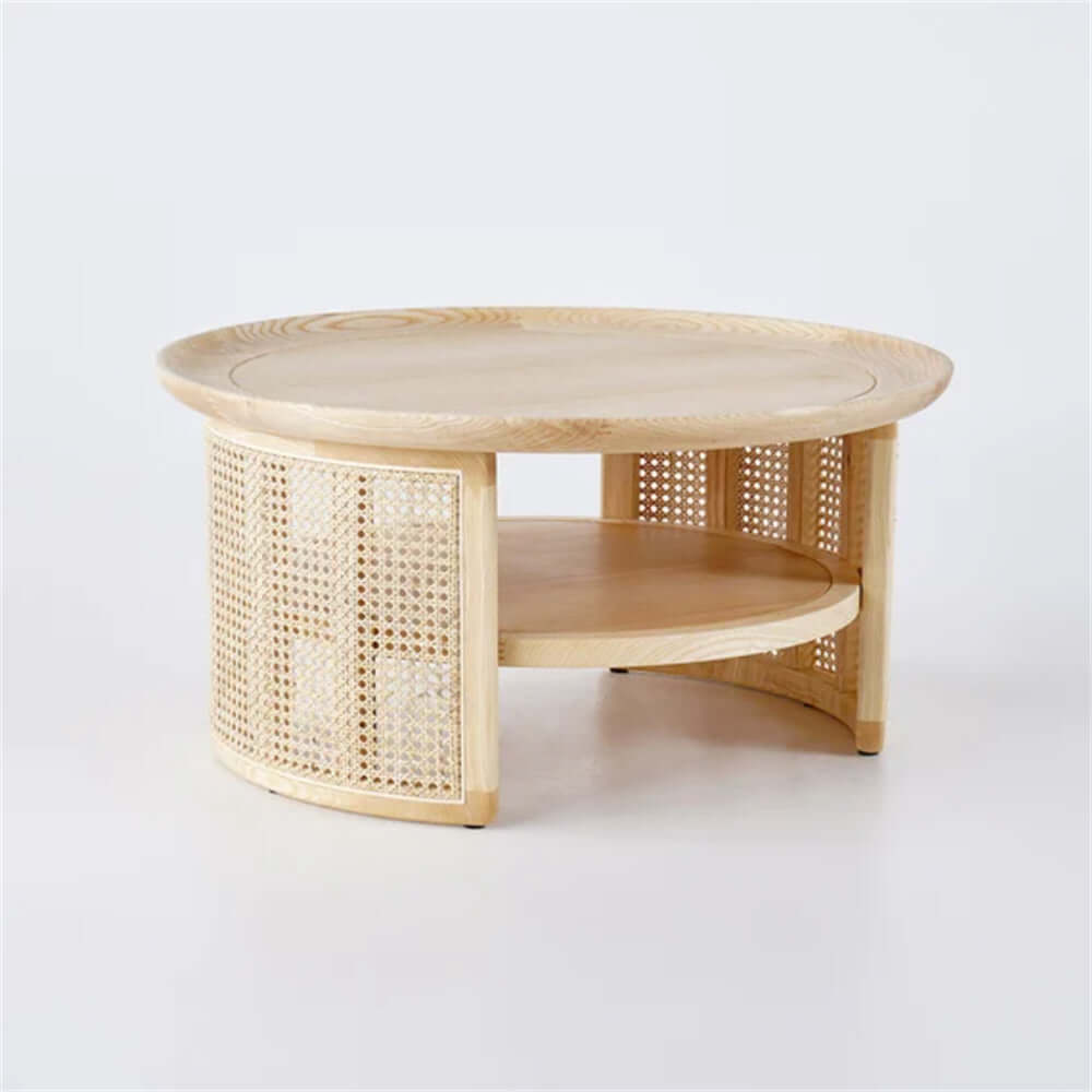 Round Japandi coffee table with solid wood top and rattan base, featuring two tiers for storage