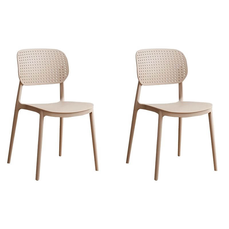 Stackable Scandinavian style plastic and acrylic side chair with low back for dining