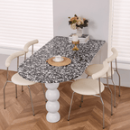 Half-elliptical terrazzo dining table with multicolor mosaic design, durable and stylish