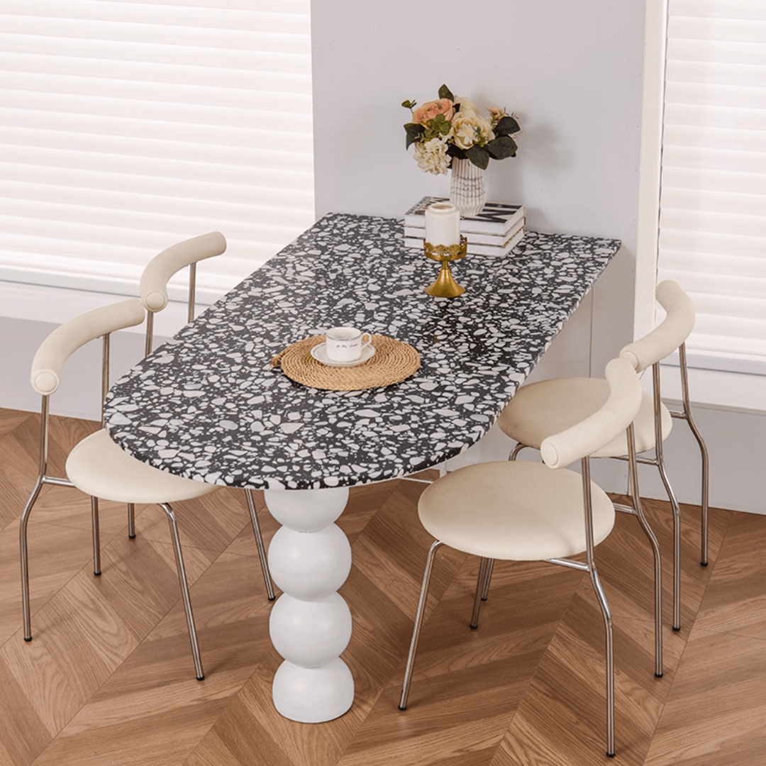 Half-elliptical terrazzo dining table with multicolor mosaic design, durable and stylish