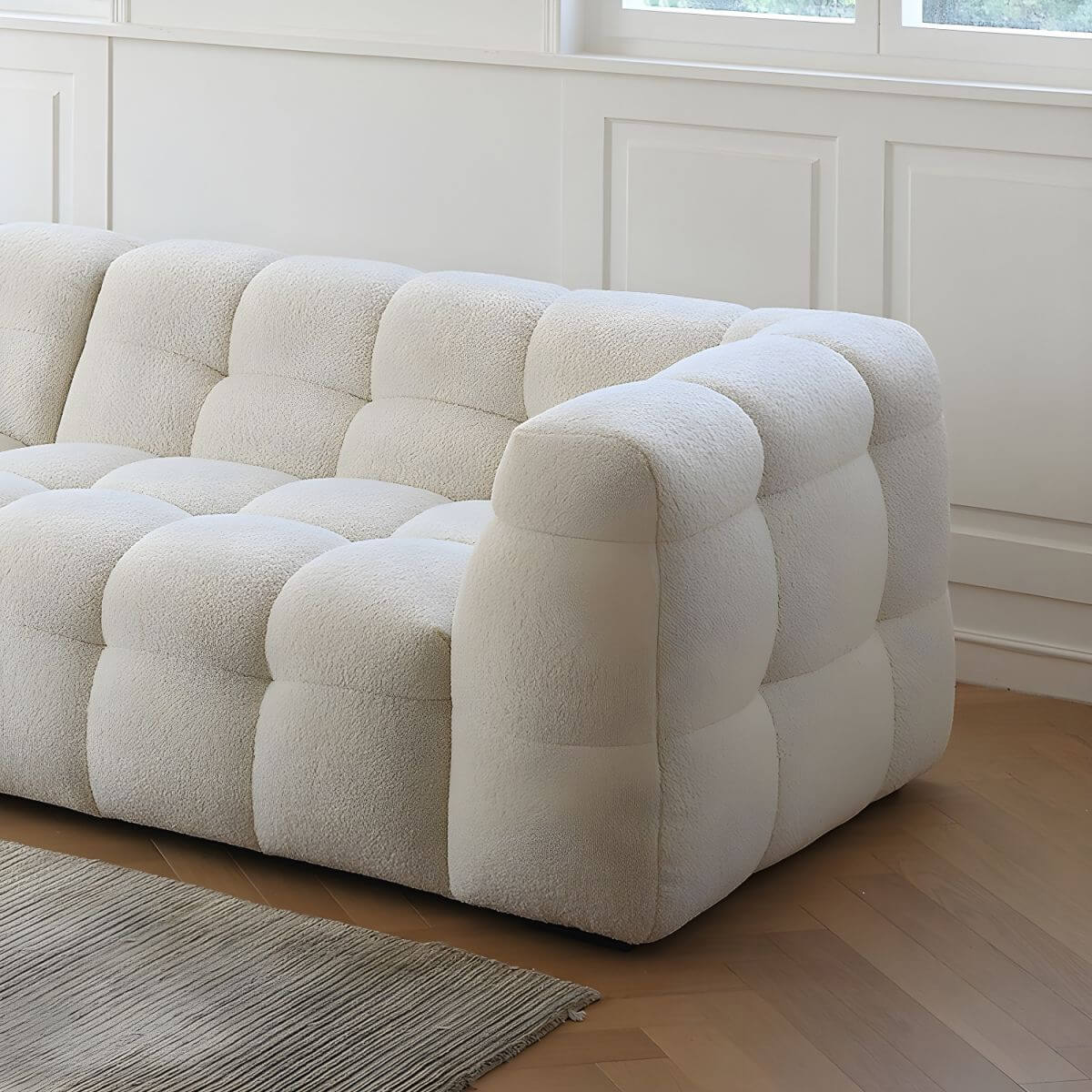 White fabric tuxedo arm sofa with biscuit back, 27.55 inches tall