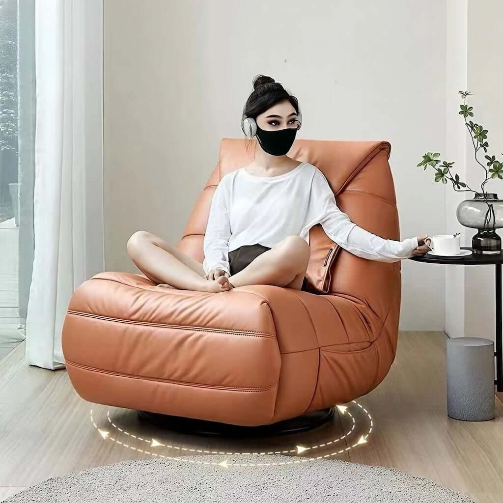 Orange adjustable angle Leath-Aire lounge chair with caterpillar design, single sofa style