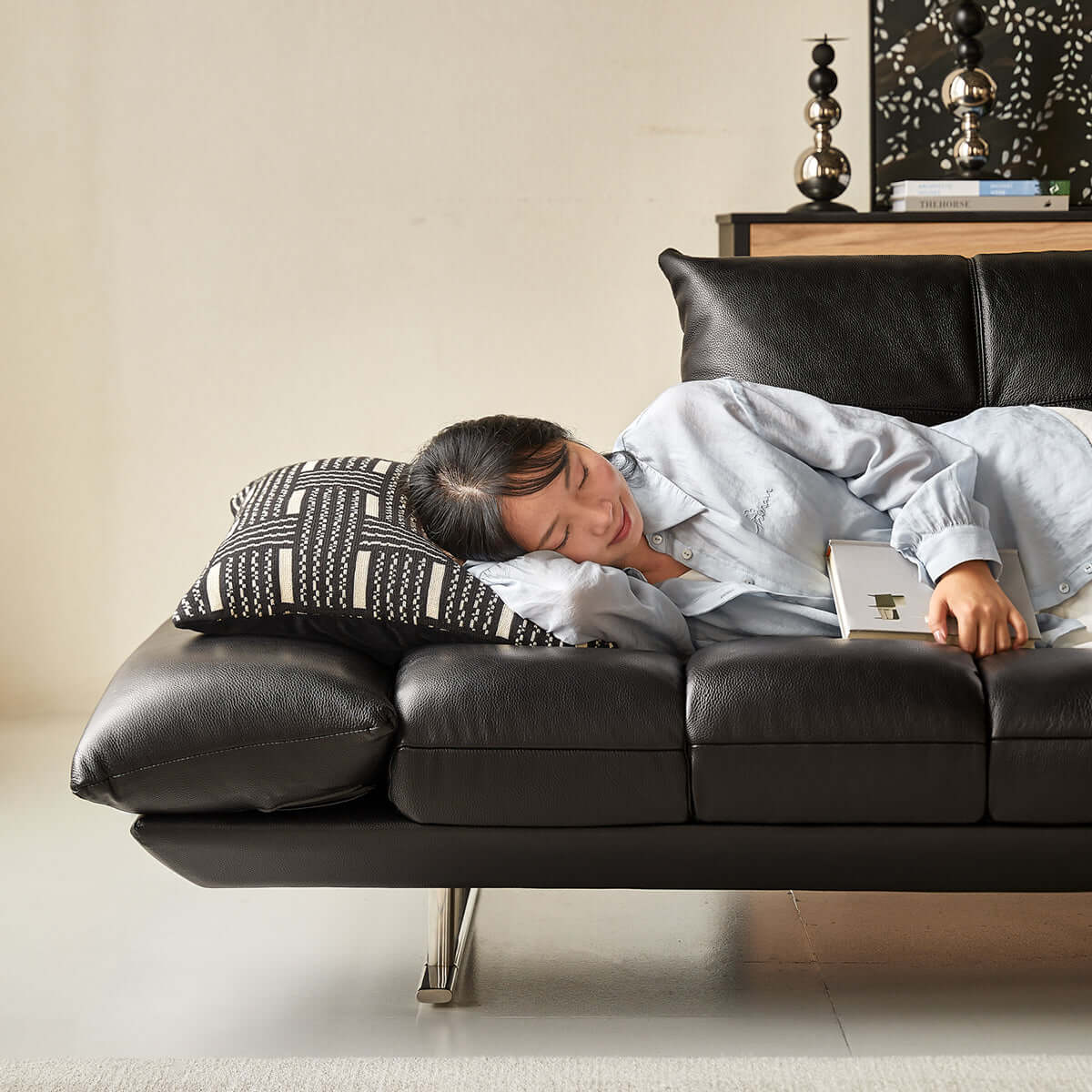 Double sided leather upholstered sofa designed for living room comfort and style