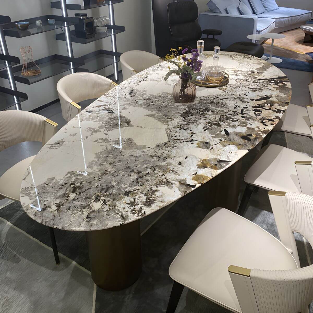 Oval marble dining table with white top and three gold steel legs main product image Hauptbild