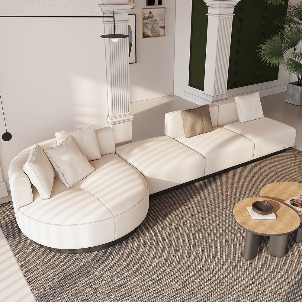 Beige modern L-shaped sectional sofa with pillows and black legs, perfect for corner seating