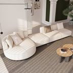 Beige modern L-shaped sectional sofa with pillows and black legs, perfect for corner seating