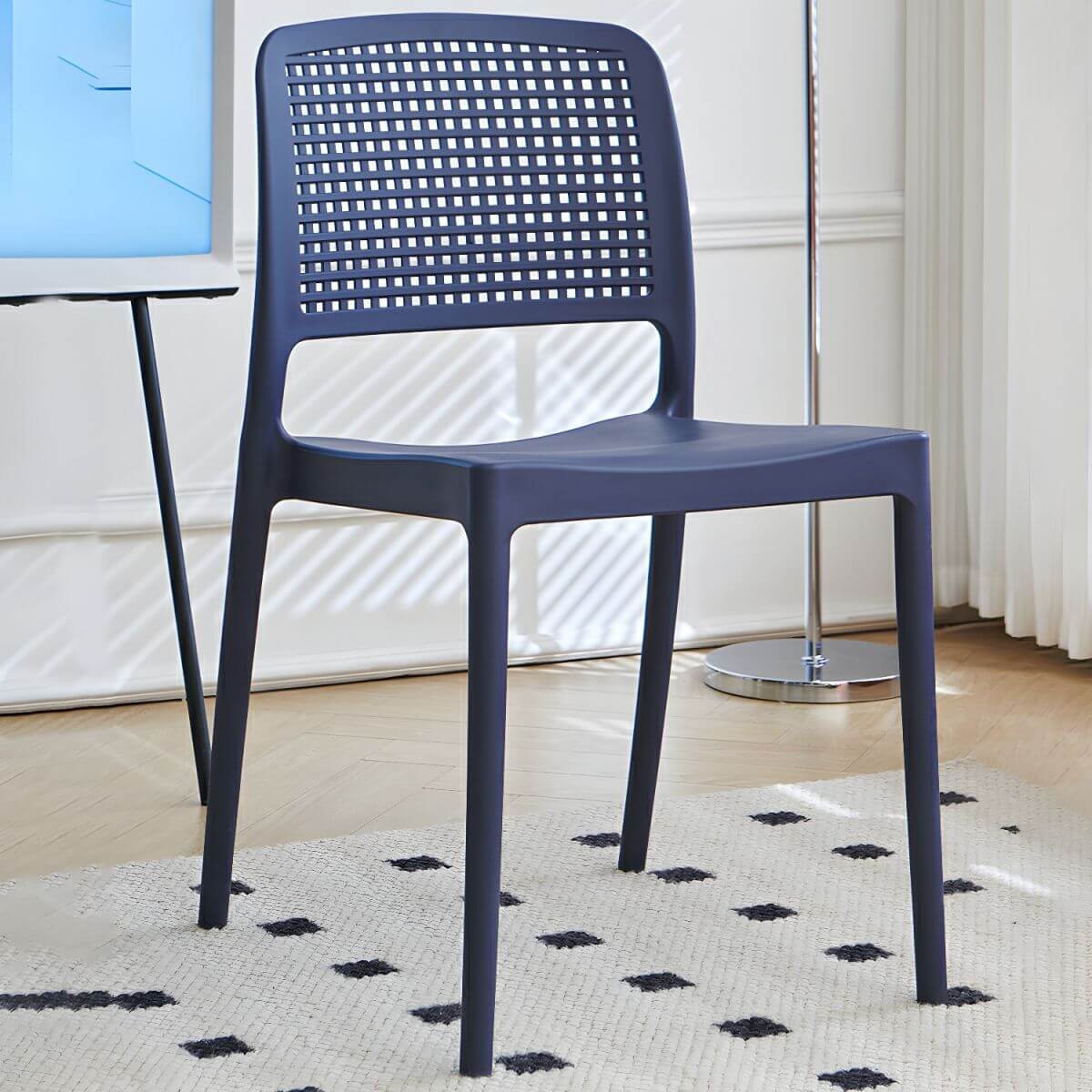 Stackable modern plastic and acrylic side chair for kitchen and dining use