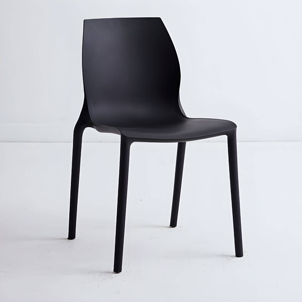 Stackable modern Scandinavian plastic and acrylic chair for kitchen and dining use