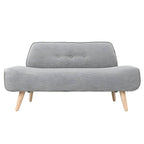 Small Scandinavian style sofa with wood frame and solid color polyester upholstery