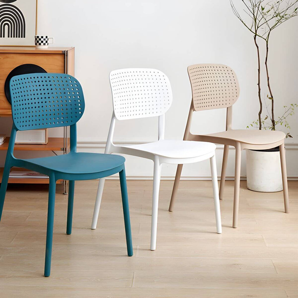 Stackable Scandinavian style plastic and acrylic side chair with low back for dining