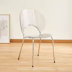Stackable Scandinavian style dining chair with plastic seat, acrylic back, and silver legs