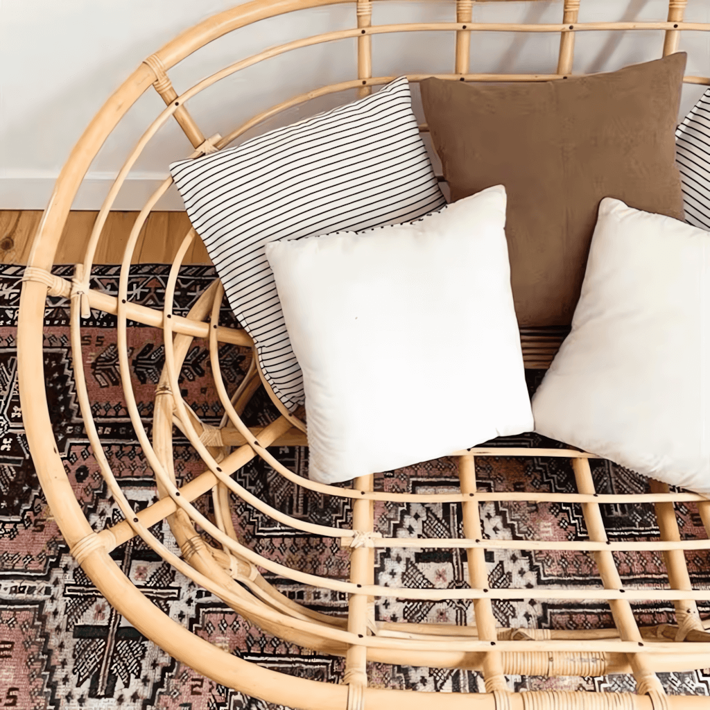 Cozy natural rattan papasan chair available in single or double size for comfortable lounging