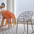 Scandinavian style sloped arm chair made of plastic and acrylic, ideal for kitchen and dining areas