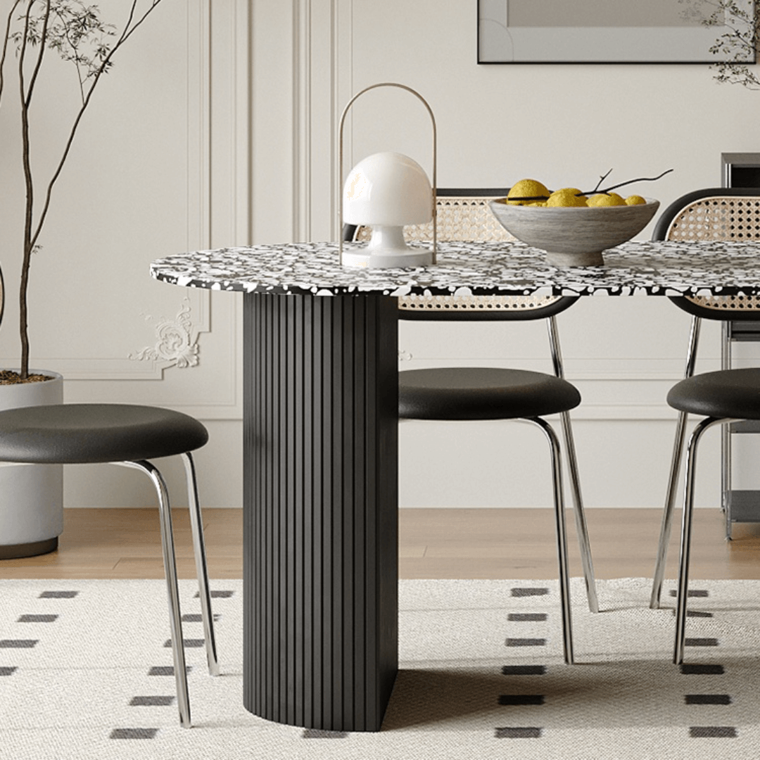 Modern black and white terrazzo dining table with sleek vintage design