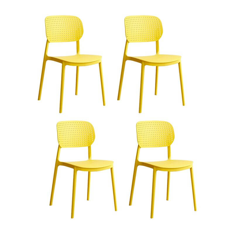 Stackable Scandinavian style plastic and acrylic side chair with low back for dining