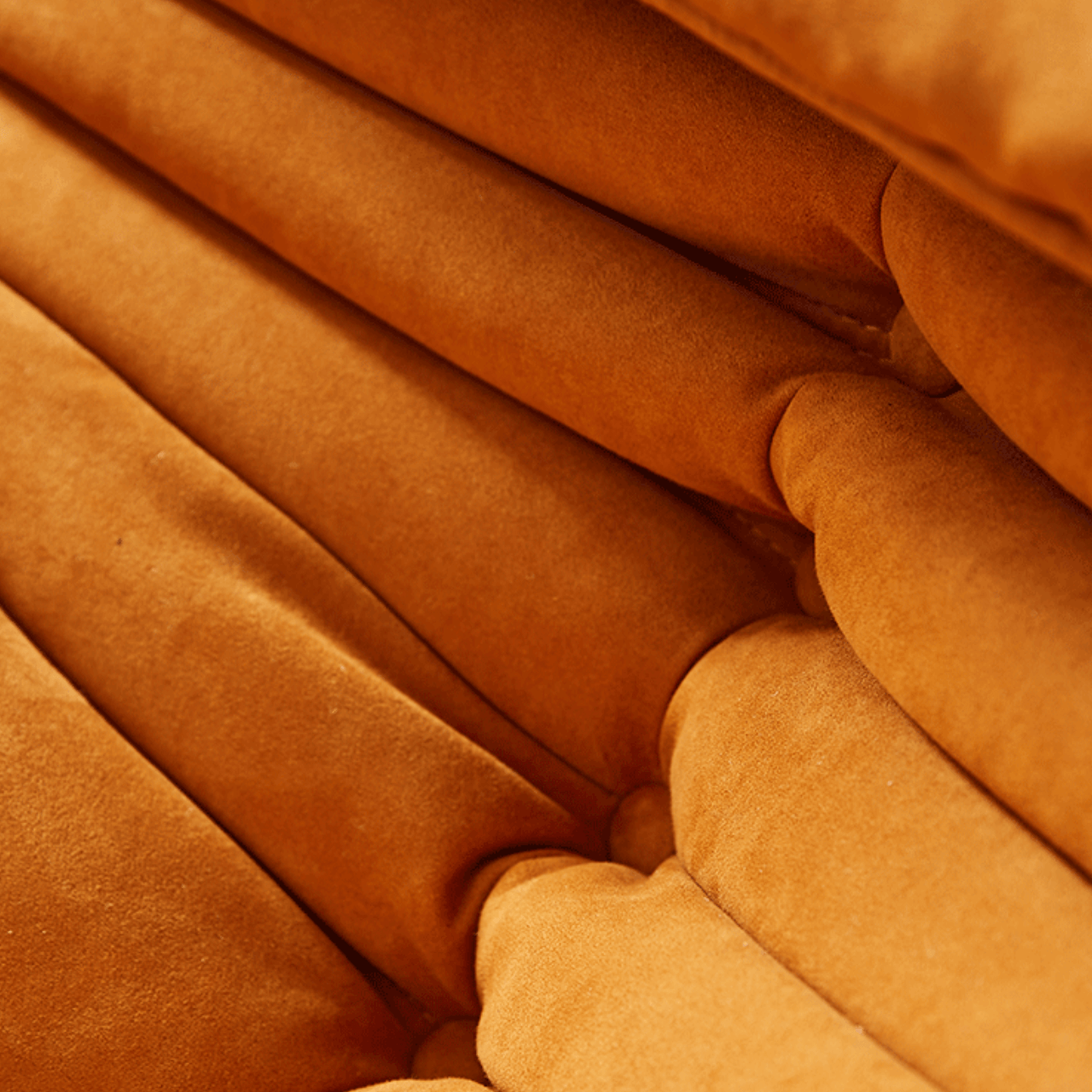 Burnt Caterpillar single lounge chair with Togo sofa design, perfect for modern living spaces