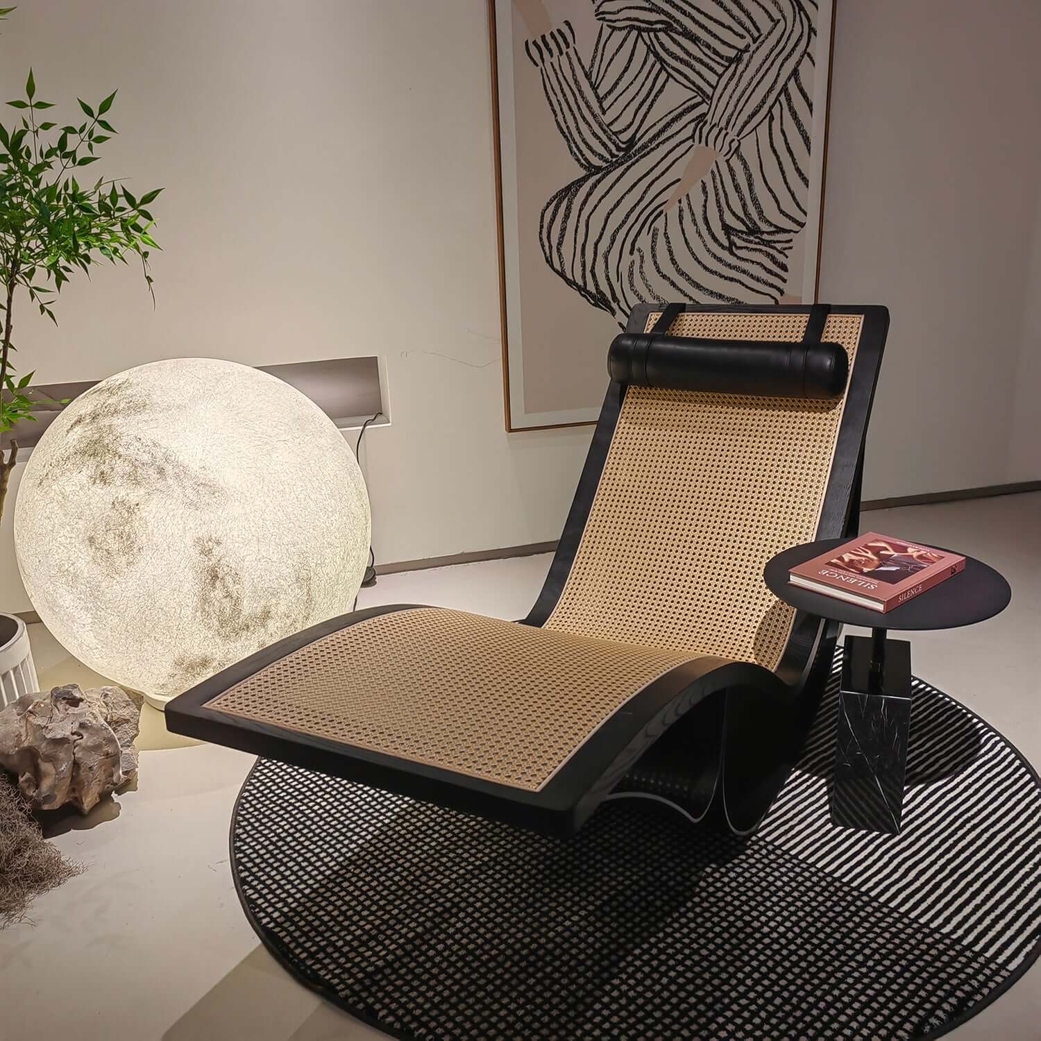 Black vintage chaise lounge chair made of cane wood with elegant design