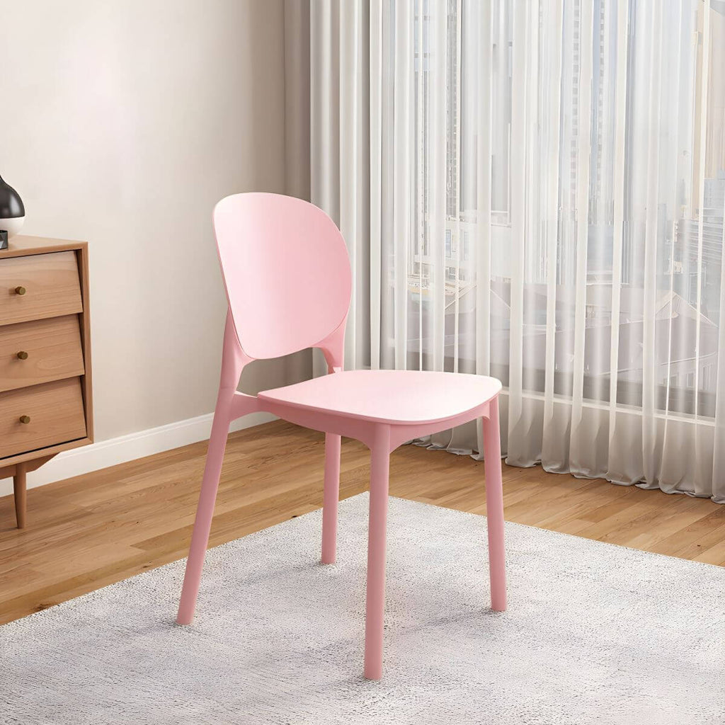 Stackable Scandinavian side chair with open back made of plastic and acrylic for dining