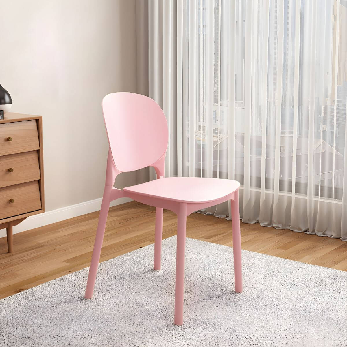 Stackable Scandinavian side chair with open back made of plastic and acrylic for dining