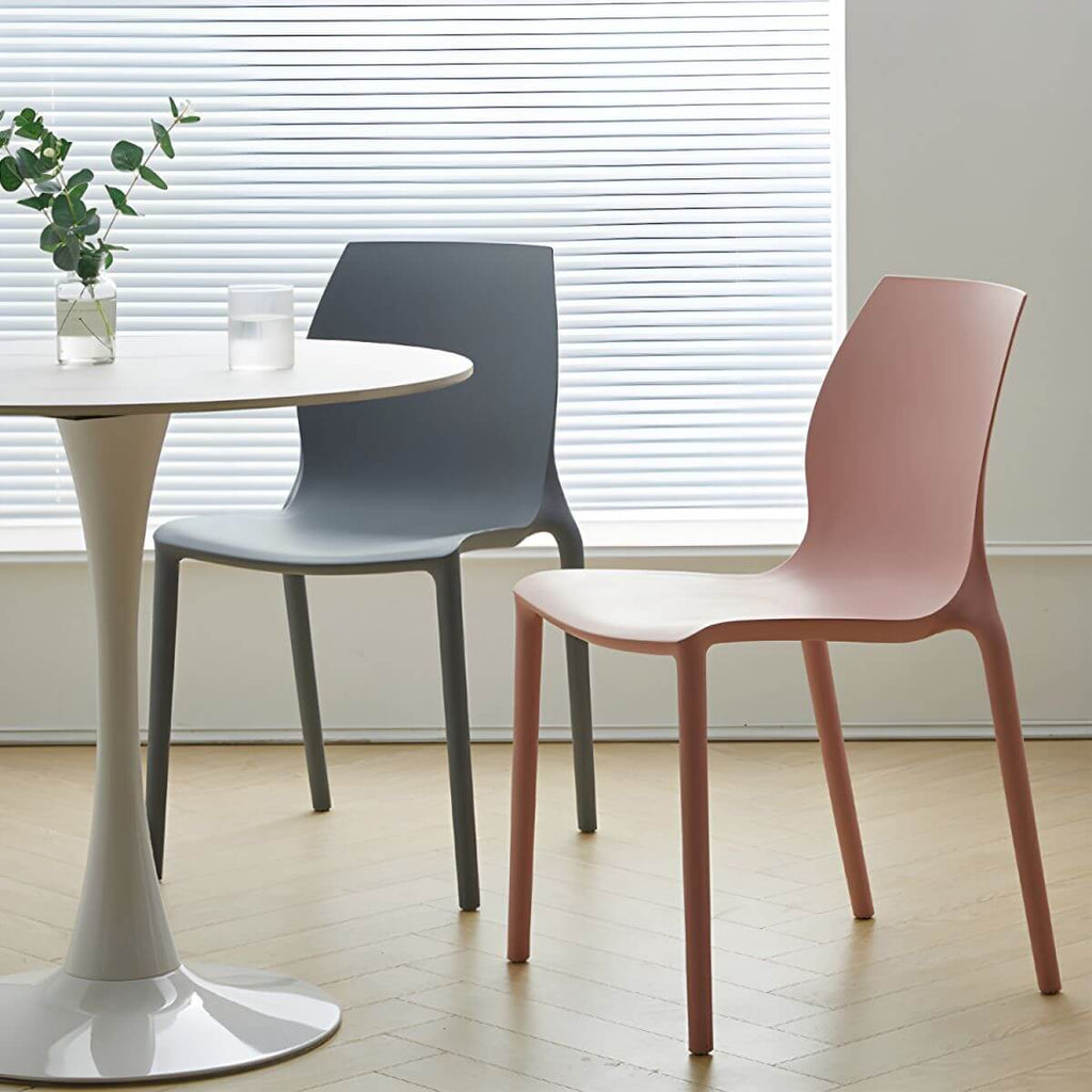 Stackable modern Scandinavian plastic and acrylic chair for kitchen and dining use