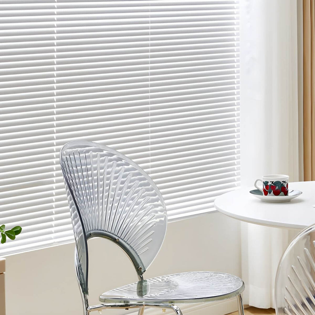 Stackable acrylic dining chair with open back and metal legs, armless design for modern dining rooms