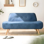 Small Scandinavian style sofa with wood frame and solid color polyester upholstery