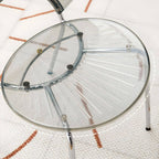 Stackable acrylic dining chair with open back and metal legs, armless design for modern dining rooms