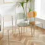 Transparent acrylic dining chair with modern design, perfect for living room and kitchen seating