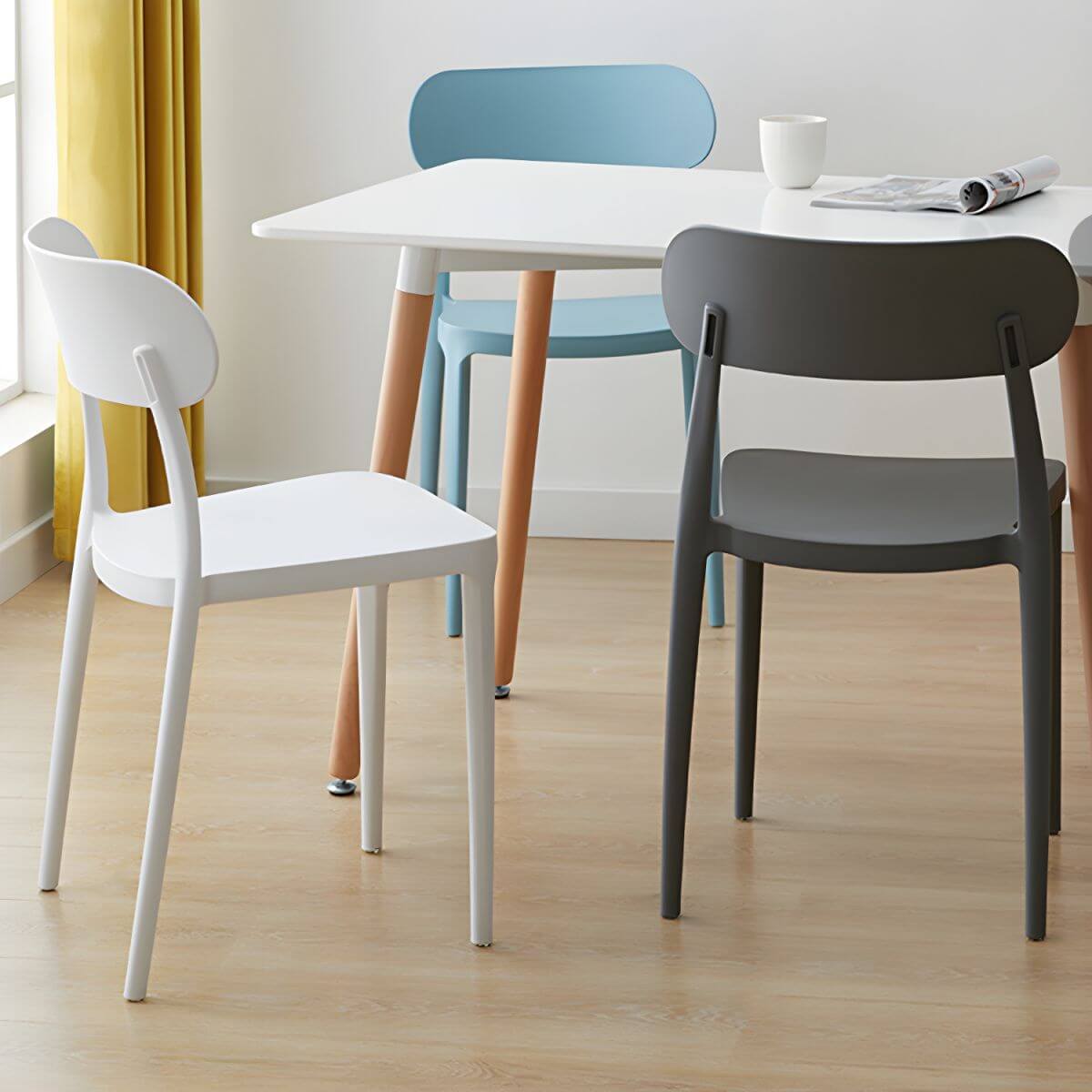 Modern Scandinavian dining chair made of plastic and acrylic, perfect for kitchen and dining areas