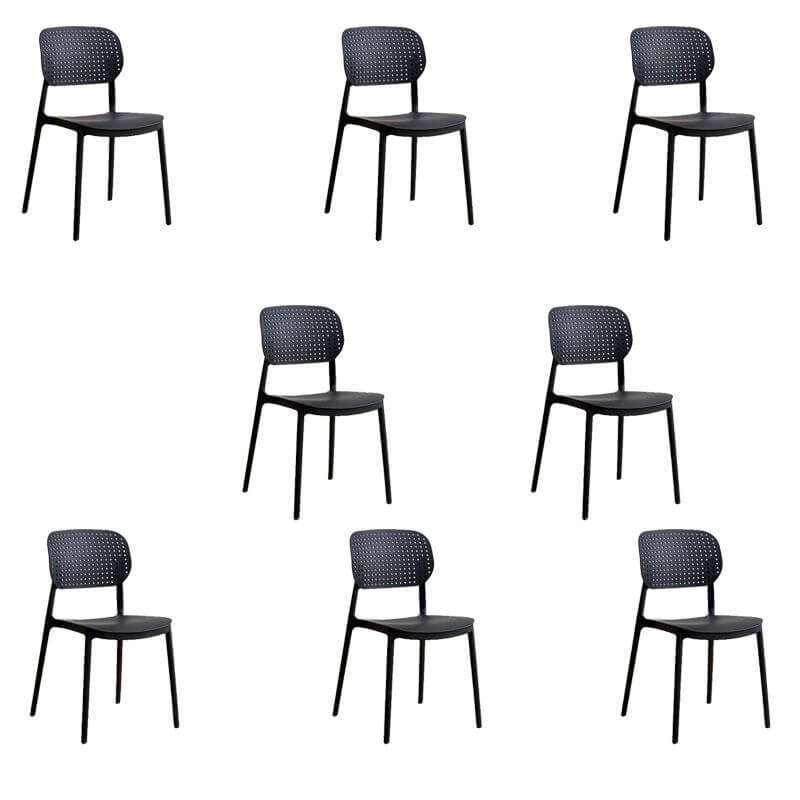 Stackable Scandinavian style plastic and acrylic side chair with low back for dining