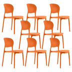 Stackable modern side chair with low back made of plastic and acrylic, perfect for contemporary dining