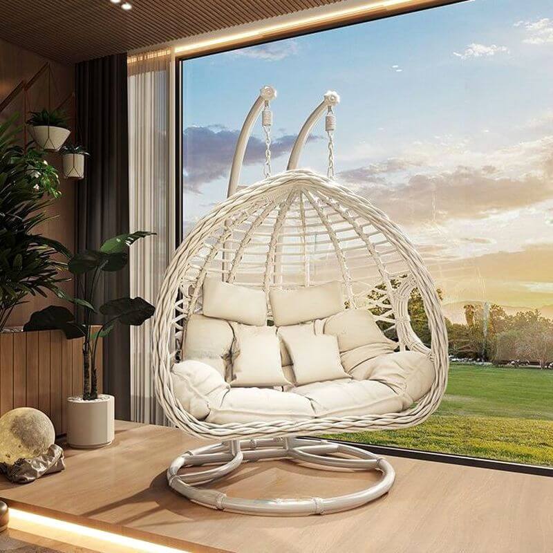 Porch swing with tropical ivory and auburn hydrophobic framed pads, metal stand and chain included