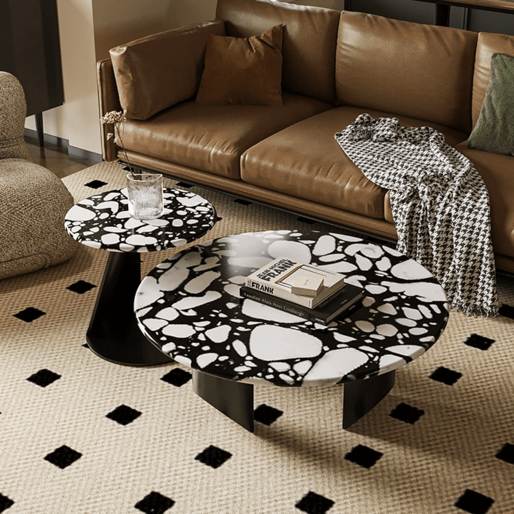 Round terrazzo coffee table set with black and white pattern, perfect for modern living rooms