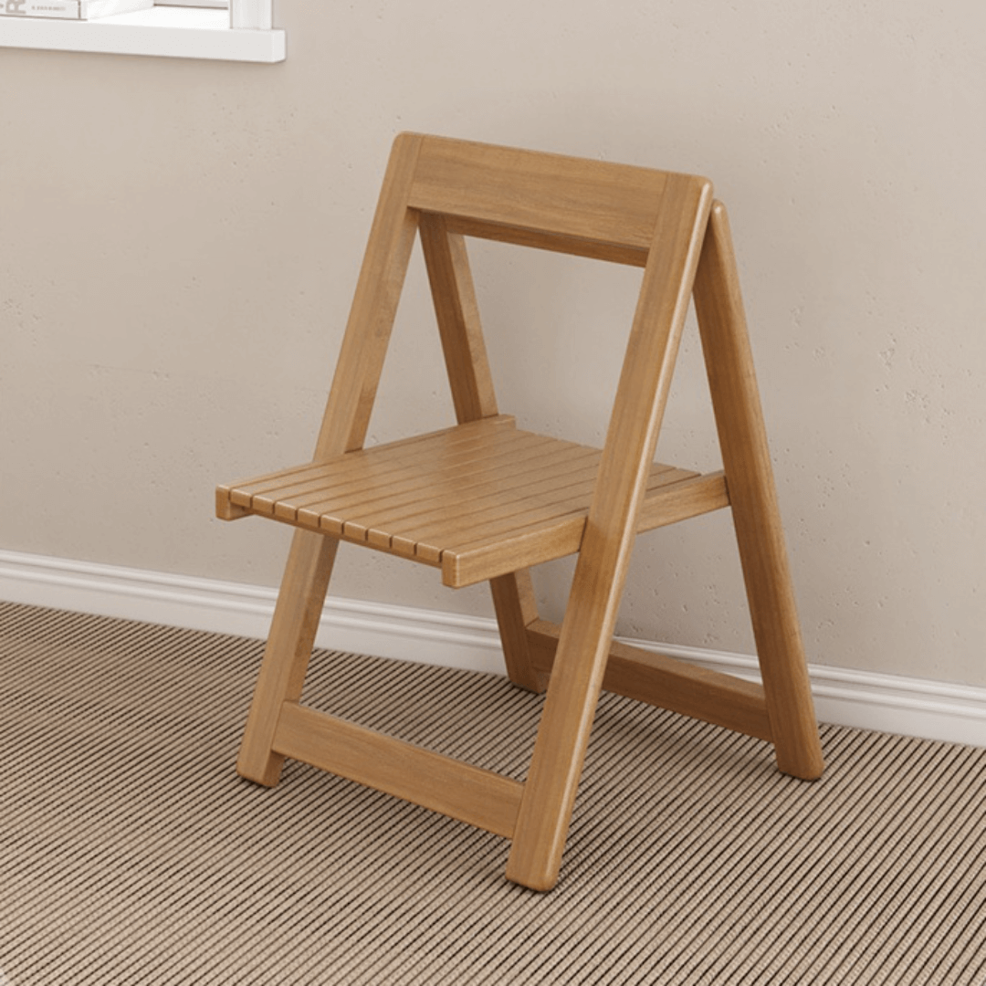 Round folding dining table with marble texture, perfect for small homes and space-saving design