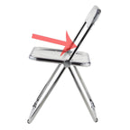 Contemporary acrylic folding armless chair with open back, ideal for dining rooms