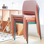 Scandinavian plastic and acrylic dining chair with low backrest and armless design