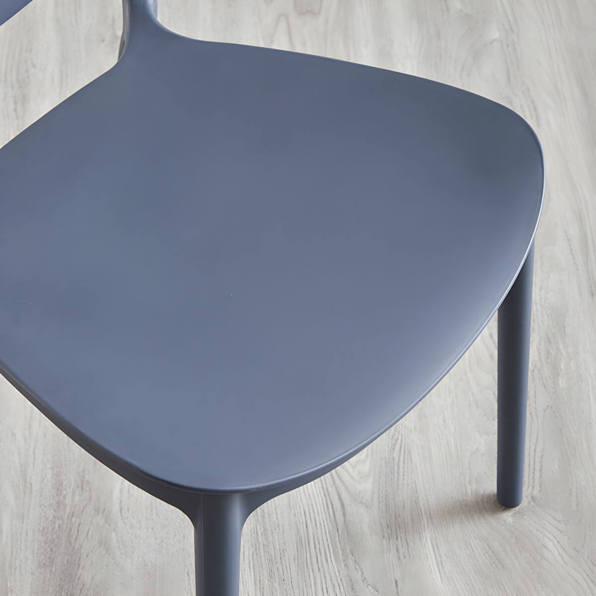 Modern acrylic dining side chair with open back, 32 inches tall, ideal for restaurant seating