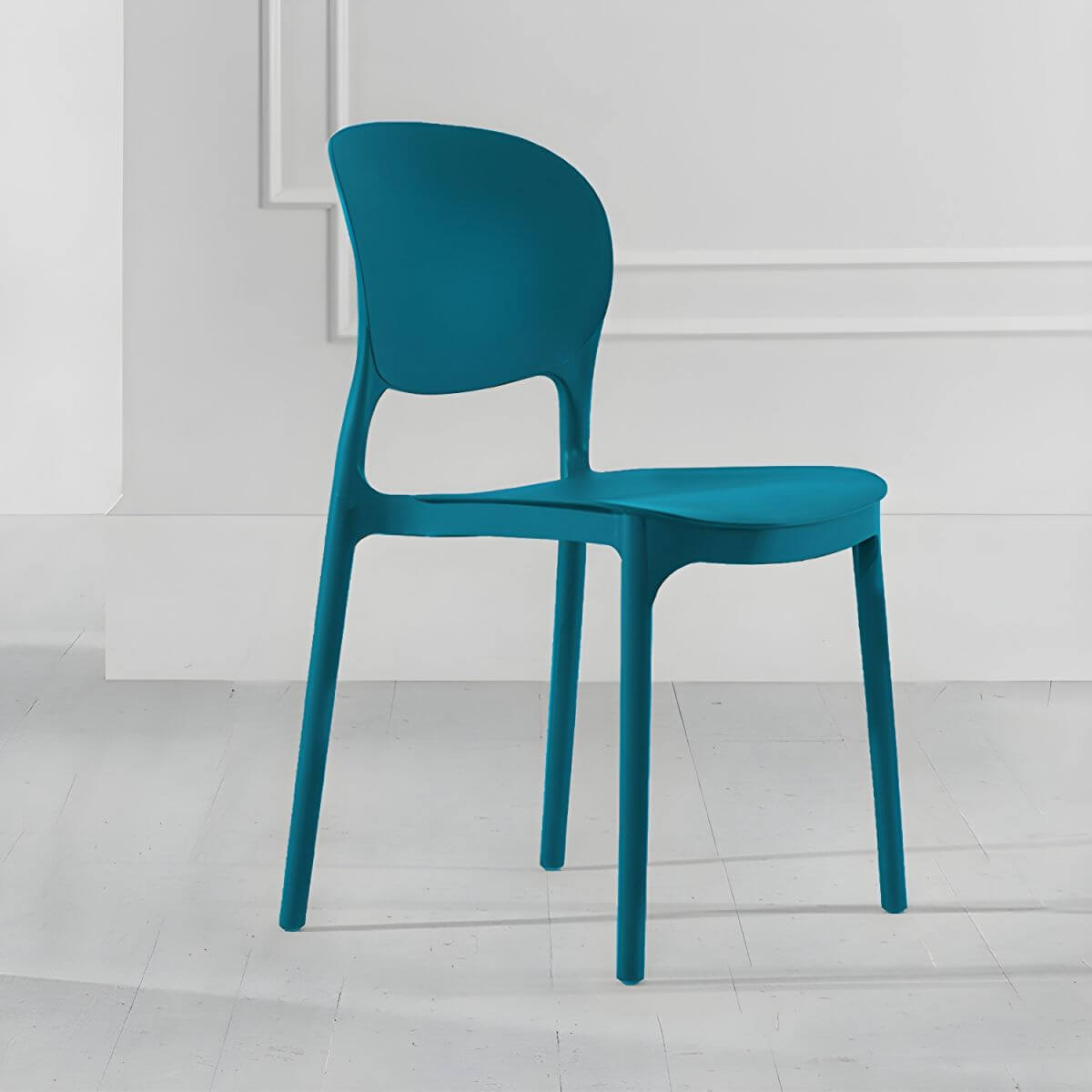 Stackable modern side chair with low back made of plastic and acrylic, perfect for contemporary dining
