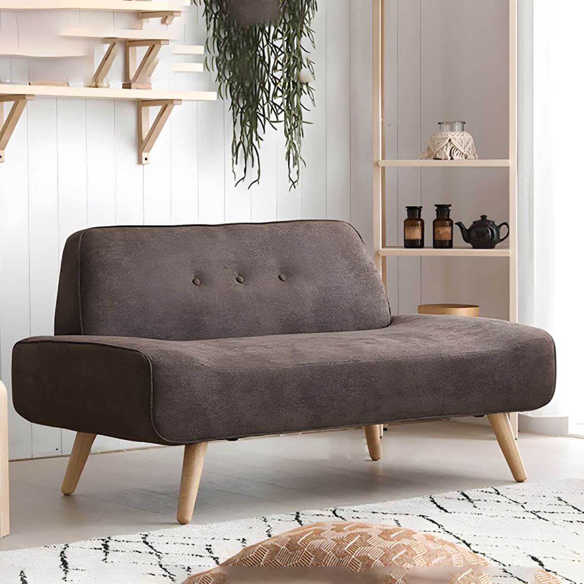 Small Scandinavian style sofa with wood frame and solid color polyester upholstery