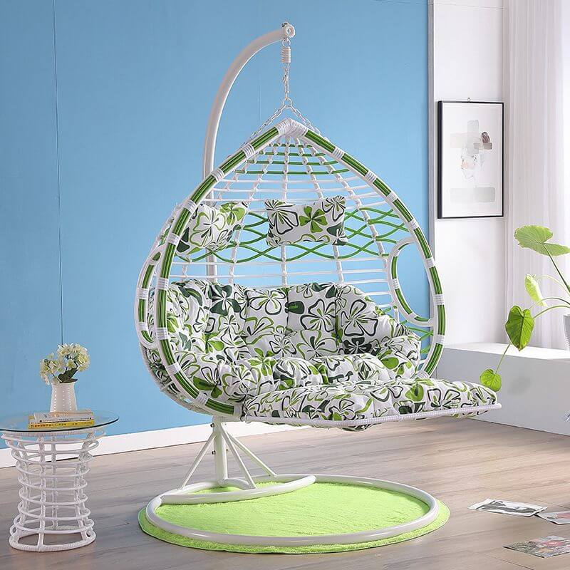 Metal porch swing with cushions, chain, and stand, designed to be heat resistant for outdoor use