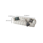 White Scandinavian fabric sofa with biscuit back and tuxedo arms