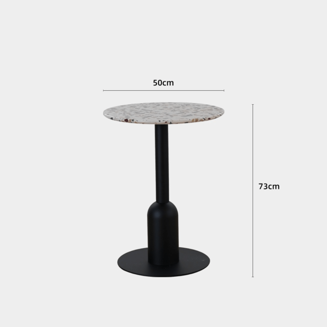 Round terrazzo table ideal for dining or office use with versatile design
