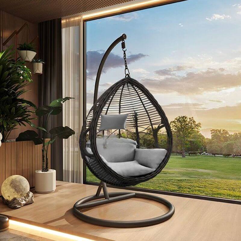 Porch swing with tropical ivory and auburn hydrophobic framed pads, metal stand and chain included