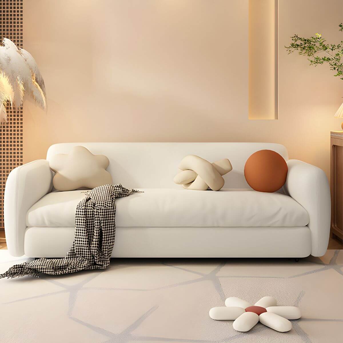 Modern white sleeper sofa with detachable mattress, casters, and black legs, 51 by 37 inches