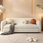 Modern white sleeper sofa with detachable mattress, casters, and black legs, 51 by 37 inches