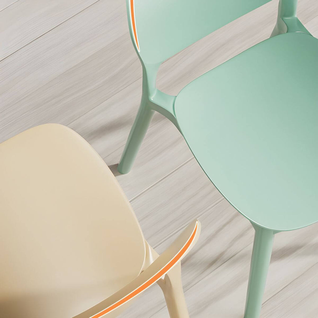 Stackable Nordic dining chair with acrylic legs and ergonomic backrest for modern dining rooms