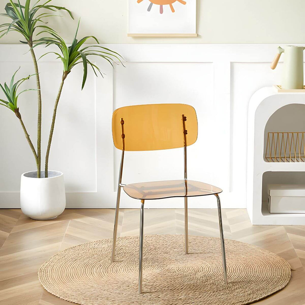 Transparent acrylic dining chair with modern design, perfect for living room and kitchen seating